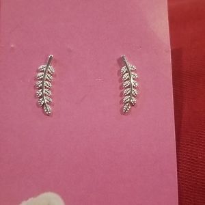 Silver tone feather earrings